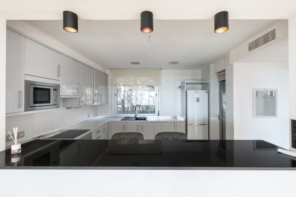 Exclusive apartment with partial sea views and private garage