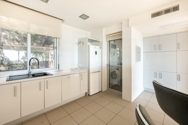 Exclusive apartment with partial sea views and private garage