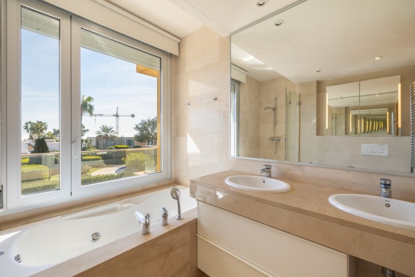 Exclusive apartment with partial sea views and private garage