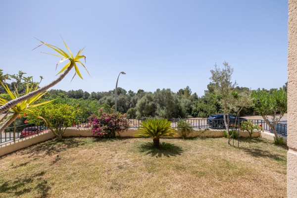 Erdgeschosswohnung in einem Zweifamilienhaus mit privatem Garten in Es Caülls, Marratxí
