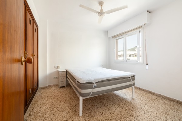 Seafront Apartment with Panoramic Sea Views, Pool and Excellent Potential in Sant Agustí