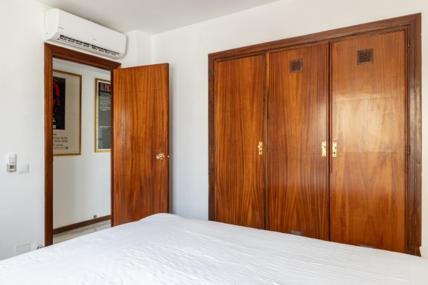 Seafront Apartment with Panoramic Sea Views, Pool and Excellent Potential in Sant Agustí