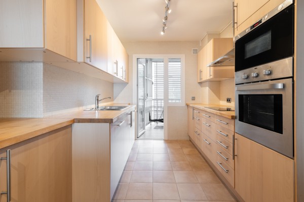 Seafront Apartment with Panoramic Sea Views, Pool and Excellent Potential in Sant Agustí