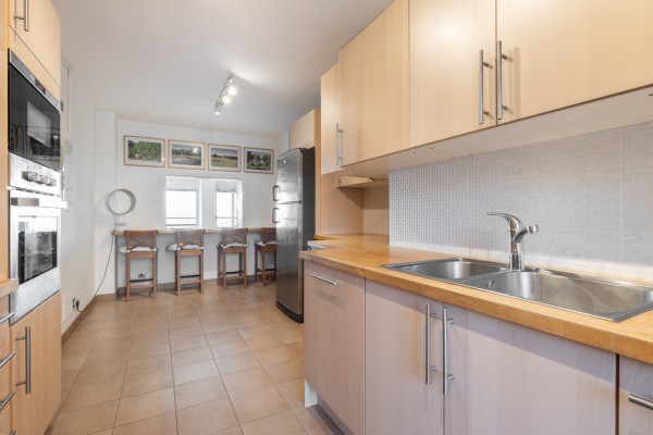 Seafront Apartment with Panoramic Sea Views, Pool and Excellent Potential in Sant Agustí