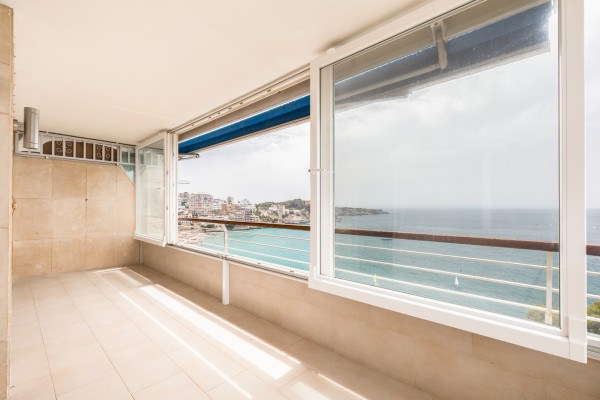 Seafront Apartment with Panoramic Sea Views, Pool and Excellent Potential in Sant Agustí