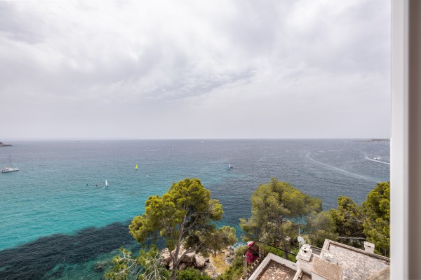 Seafront Apartment with Panoramic Sea Views, Pool and Excellent Potential in Sant Agustí