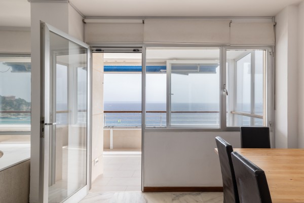 Seafront Apartment with Panoramic Sea Views, Pool and Excellent Potential in Sant Agustí