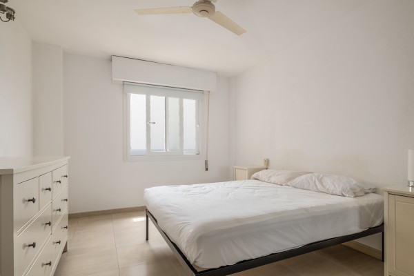 Seafront Apartment with Panoramic Sea Views, Pool and Excellent Potential in Sant Agustí