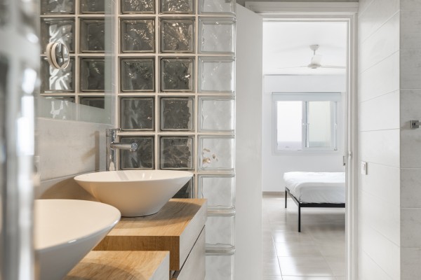 Seafront Apartment with Panoramic Sea Views, Pool and Excellent Potential in Sant Agustí