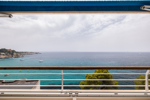 Seafront Apartment with Panoramic Sea Views, Pool and Excellent Potential in Sant Agustí